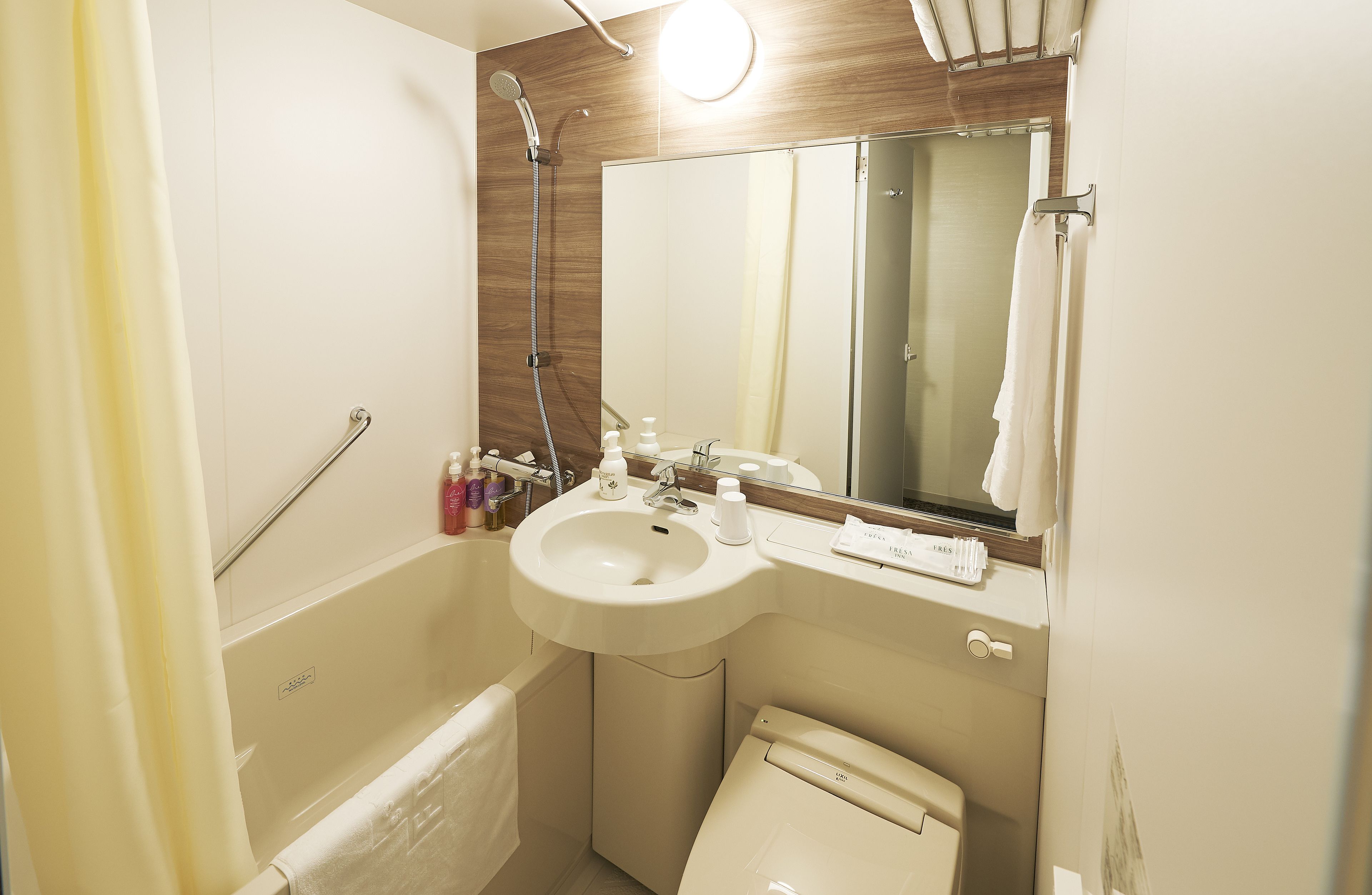 combined shower/bathtub, free toiletries, hair dryer, bathrobes