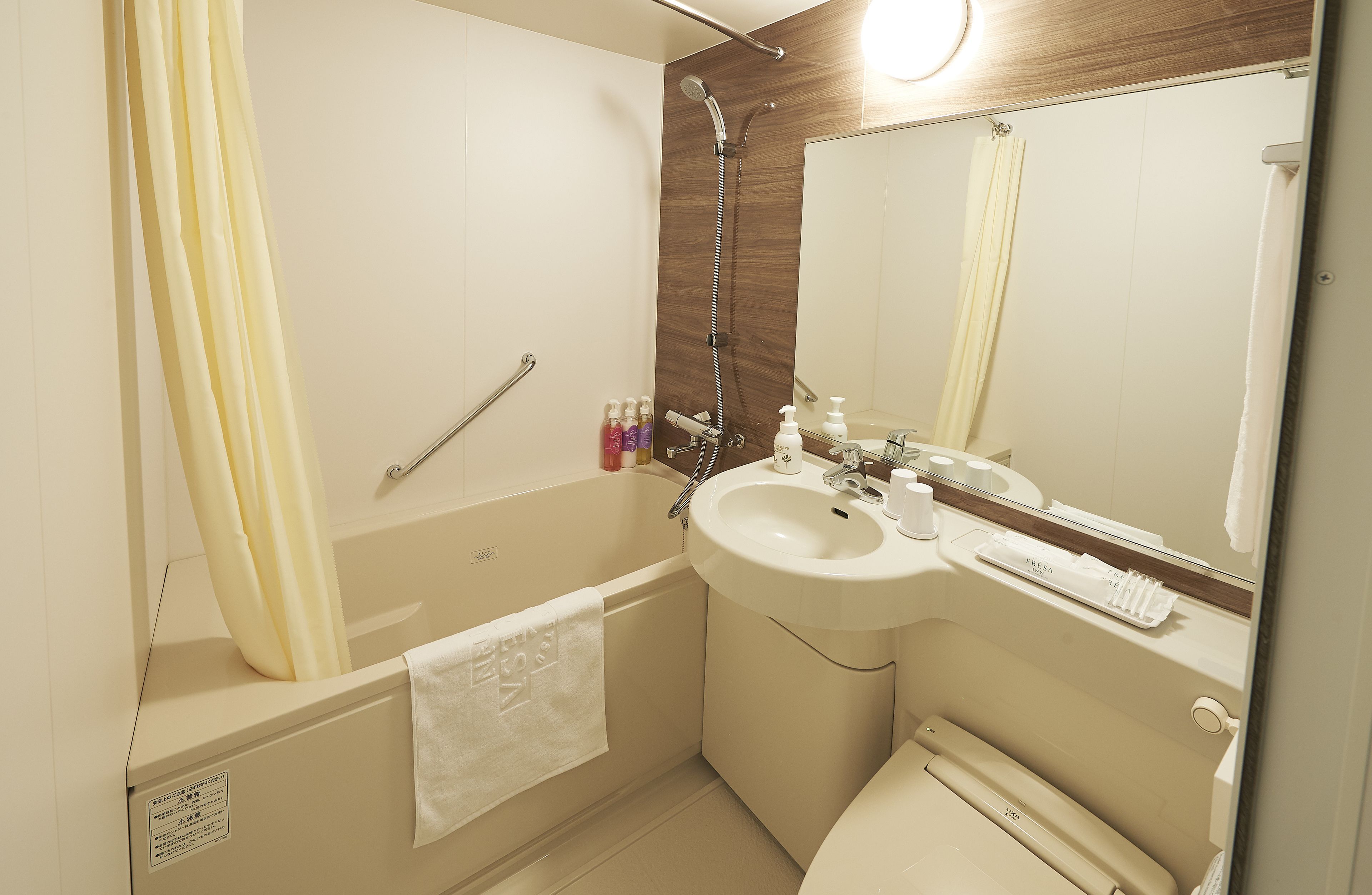 combined shower/bathtub, free toiletries, hair dryer, bathrobes