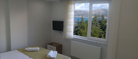 Desk, laptop workspace, blackout curtains, soundproofing