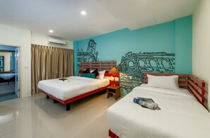 Deluxe Triple Room | MörklÀggningsgardiner, gratis wi-fi och sÀngklÀder