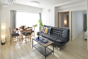 Basic Apartment, 2 Bedrooms, Non Smoking, City View (502) | Living area | Flat-screen TV