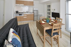 Basic Apartment, 2 Bedrooms, Non Smoking, City View (502) | Living area | Flat-screen TV