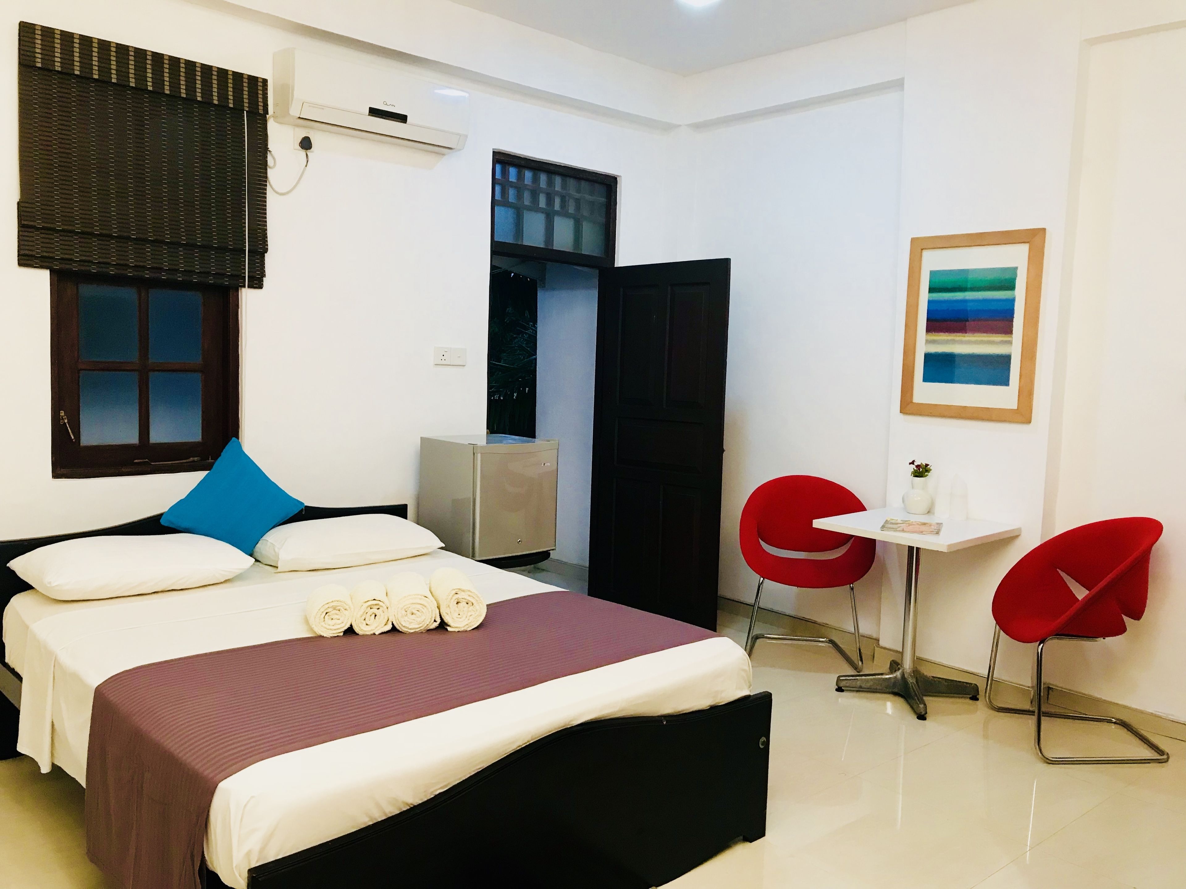 Luxe beddengoed, donsdekens, pillowtop-bedden, een minibar