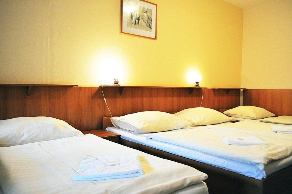 economy quadruple room | in-room safe, desk, blackout curtains, cots/infant beds