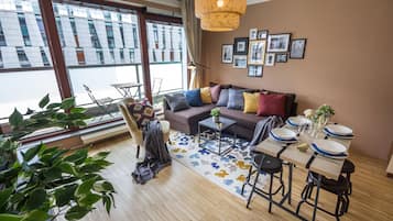 Deluxe Apartment, Non Smoking | Living room | LCD TV
