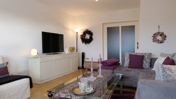 Deluxe-Apartment | Wohnzimmer | Flachbildfernseher