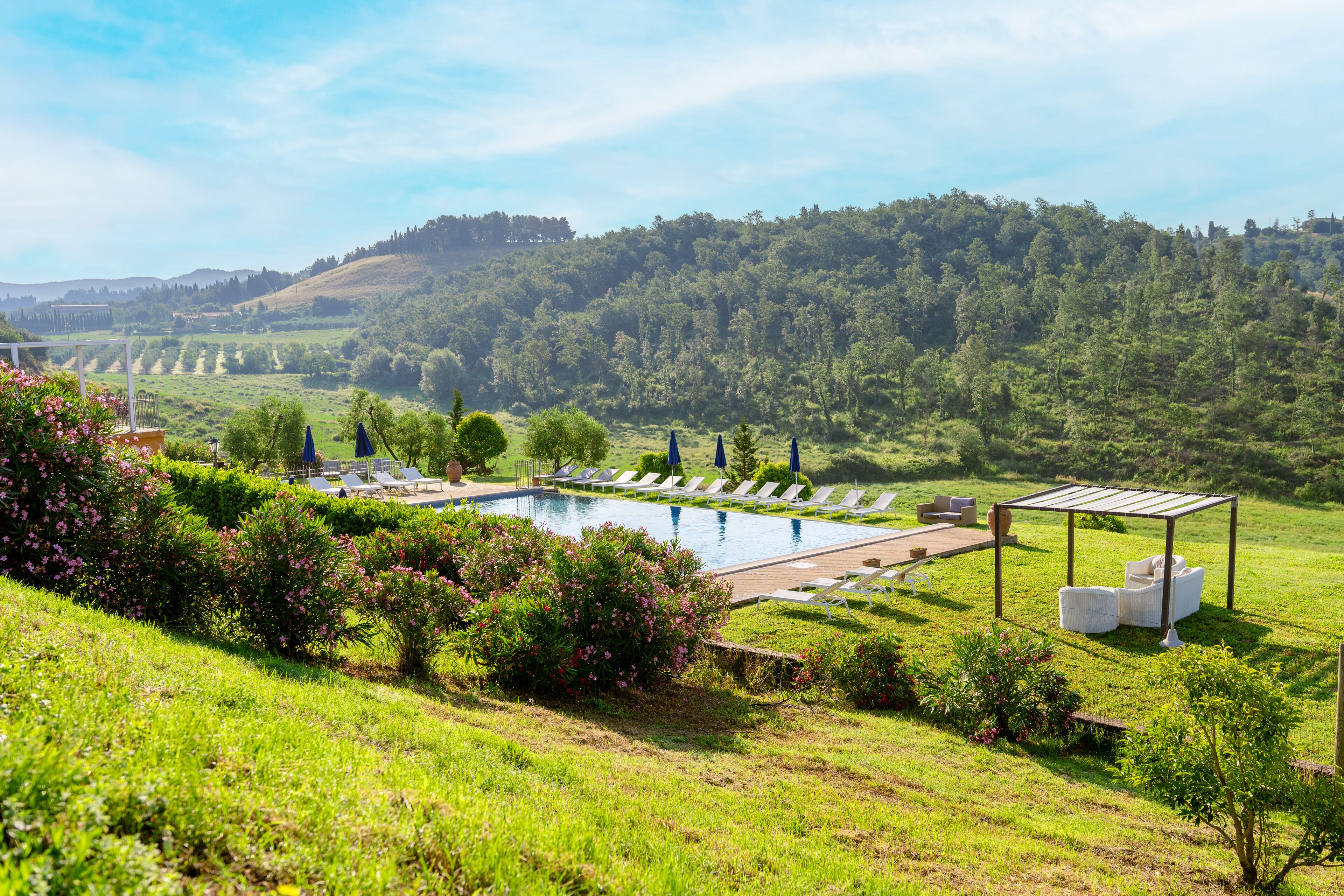 Outdoor pool, pool umbrellas, sun loungers