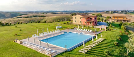 Outdoor pool, pool umbrellas, sun loungers