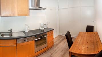 Quadruple Room | Living area | LCD TV