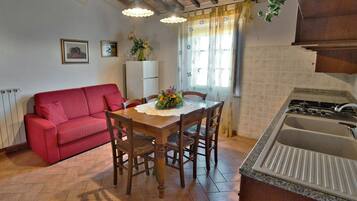 Apartment, 2 Bedrooms | Private kitchen | Full-size fridge, microwave, stovetop, espresso maker