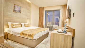 Premium bedding, pillowtop beds, minibar, in-room safe