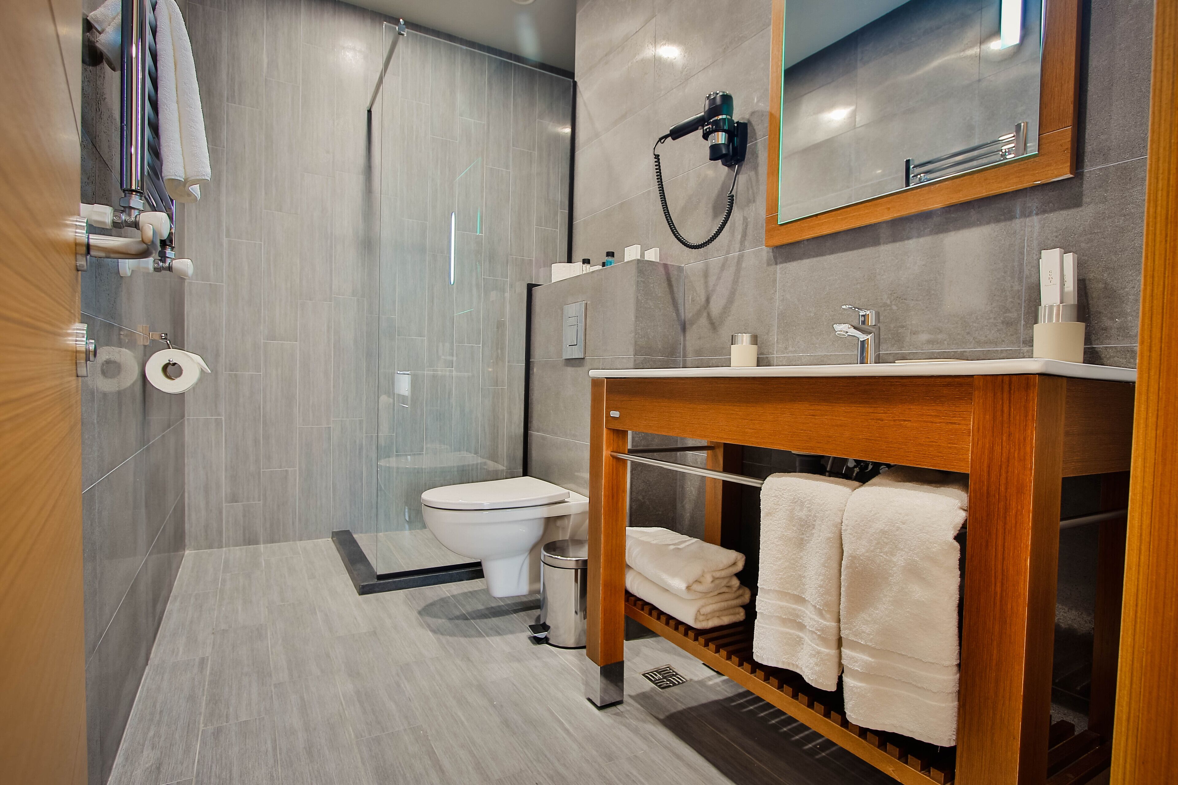 free toiletries, hair dryer, dressing gowns, slippers