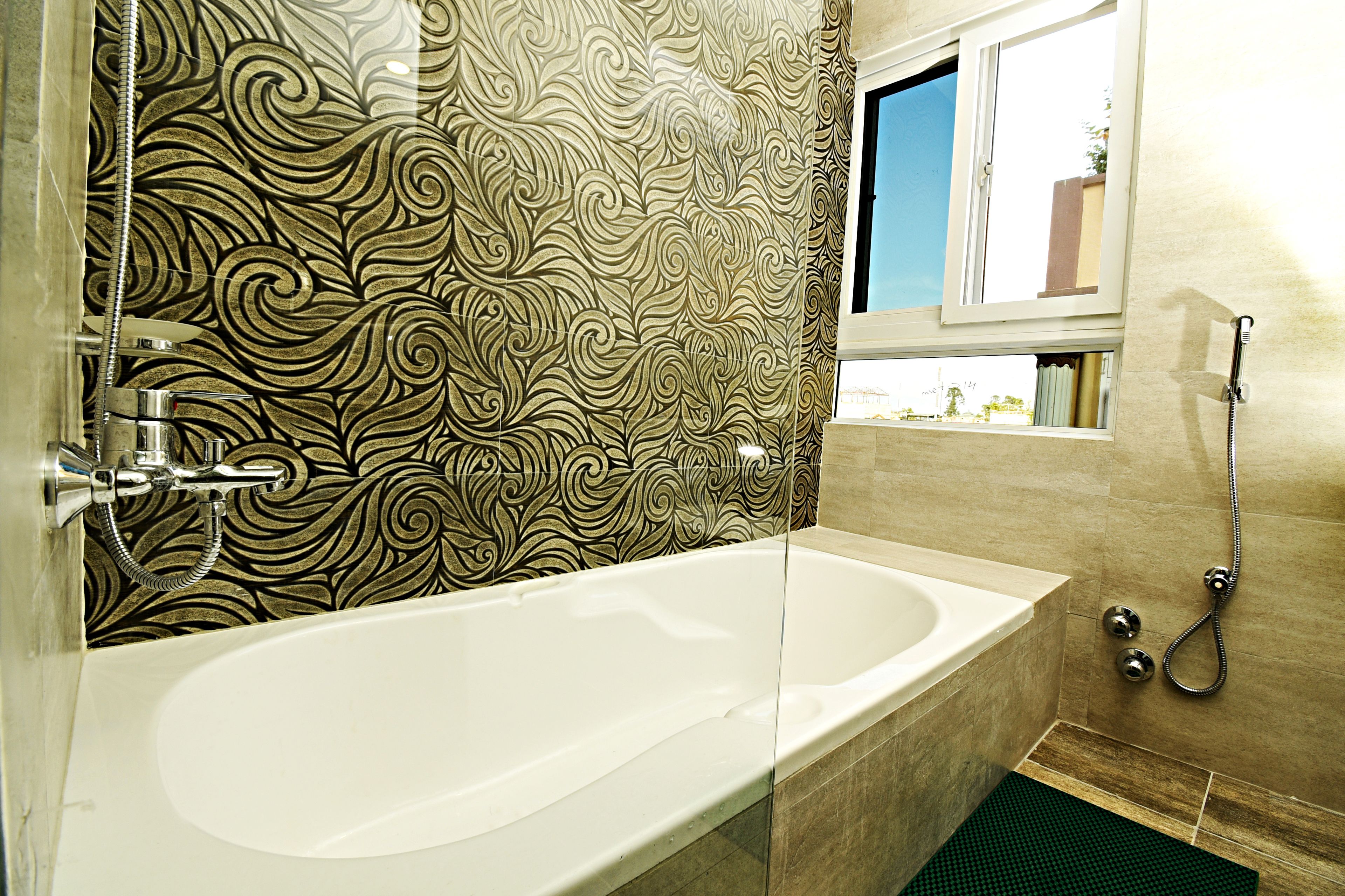 executive suite | bathroom | shower, rainfall showerhead, slippers, towels