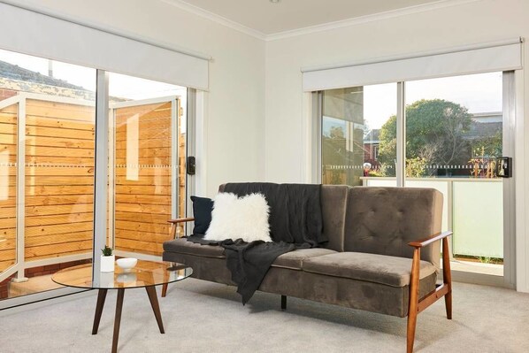 Apartment, 2 Bedrooms | Living area | Flat-screen TV