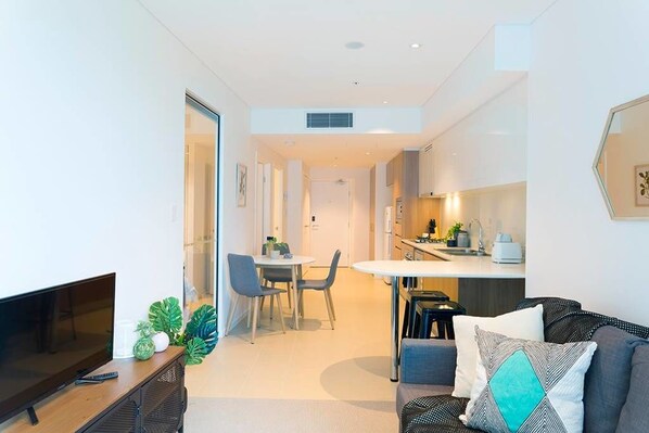 Apartment, 2 Bedrooms | Living area | Flat-screen TV