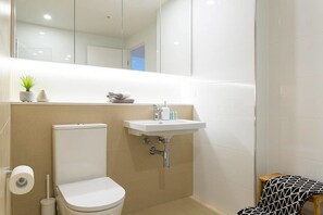 Apartment, 2 Bedrooms | Bathroom | Shower, free toiletries, hair dryer, towels