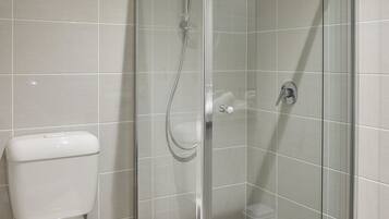 Apartment, 2 Bedrooms | Bathroom | Shower, free toiletries, hair dryer, towels