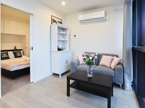 Living room - Elegant High Rise Apartment with an Unforgettable View (Melbourne)