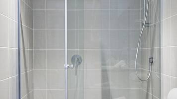 Apartment, 2 Bedrooms | Bathroom | Shower, free toiletries, hair dryer, towels