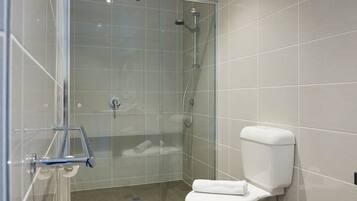 Apartment, 1 Bedroom | Bathroom | Shower, free toiletries, hair dryer, towels