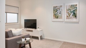 Apartment, 1 Bedroom | Living room | Flat-screen TV - Open and Flowy 1 Bedroom Apartment in Chadstone (Malvern East)