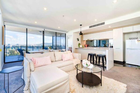Apartment, 2 Bedrooms | Living room | Flat-screen TV