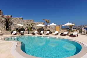 Outdoor pool, pool umbrellas, pool loungers
