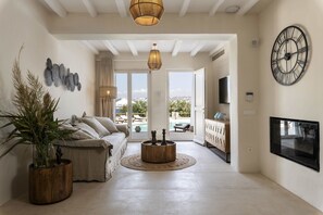 Villa, Private Pool, Sea View | Living area | Flat-screen TV - Villa Veneta at Ornos Sea View (Mykonos)