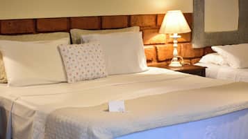 Deluxe Triple Room | Premium bedding, minibar, in-room safe, blackout drapes