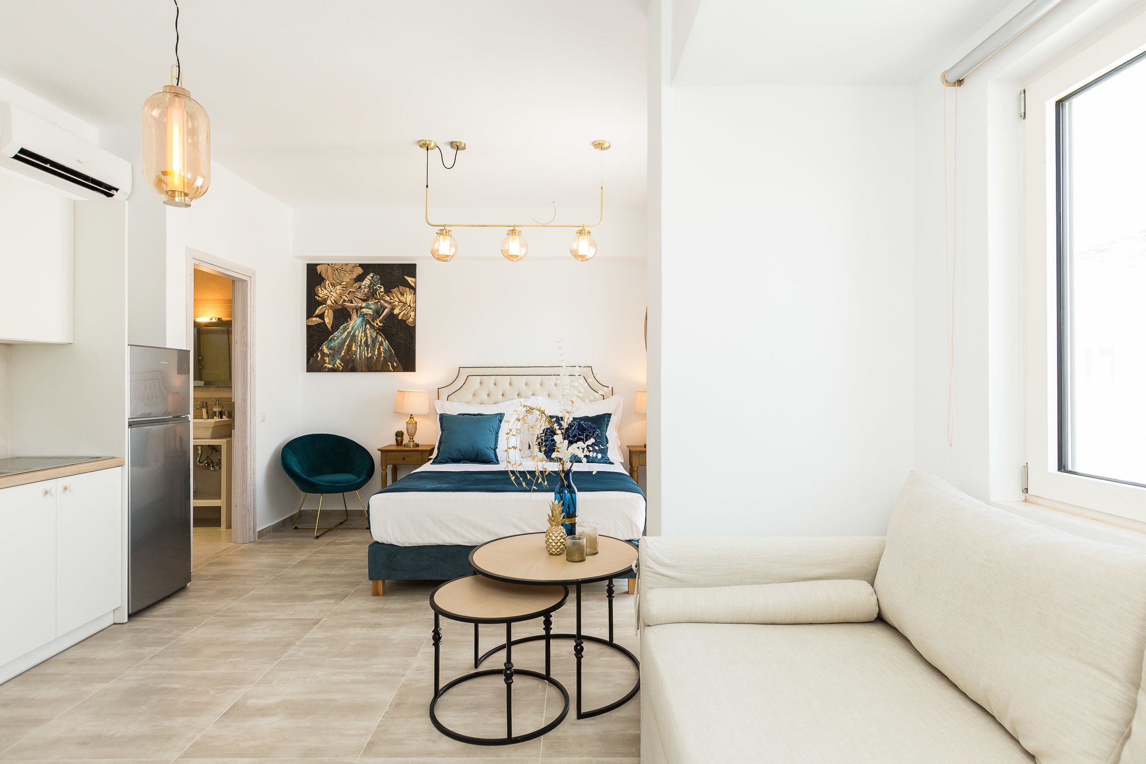 triple studio | living area | flat-screen tv