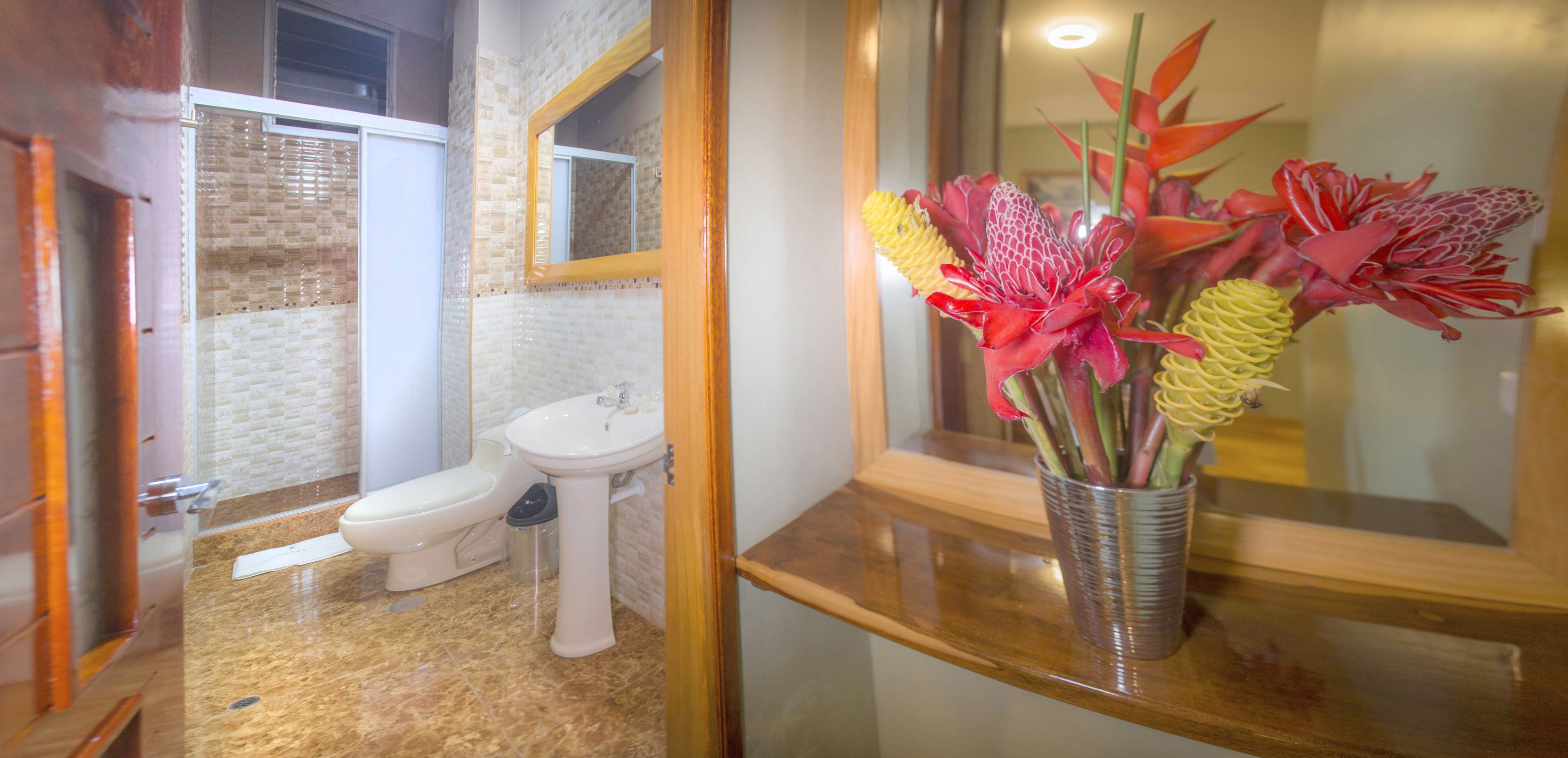 double room, 1 queen bed, private bathroom | bathroom | shower, free toiletries, hair dryer, towels