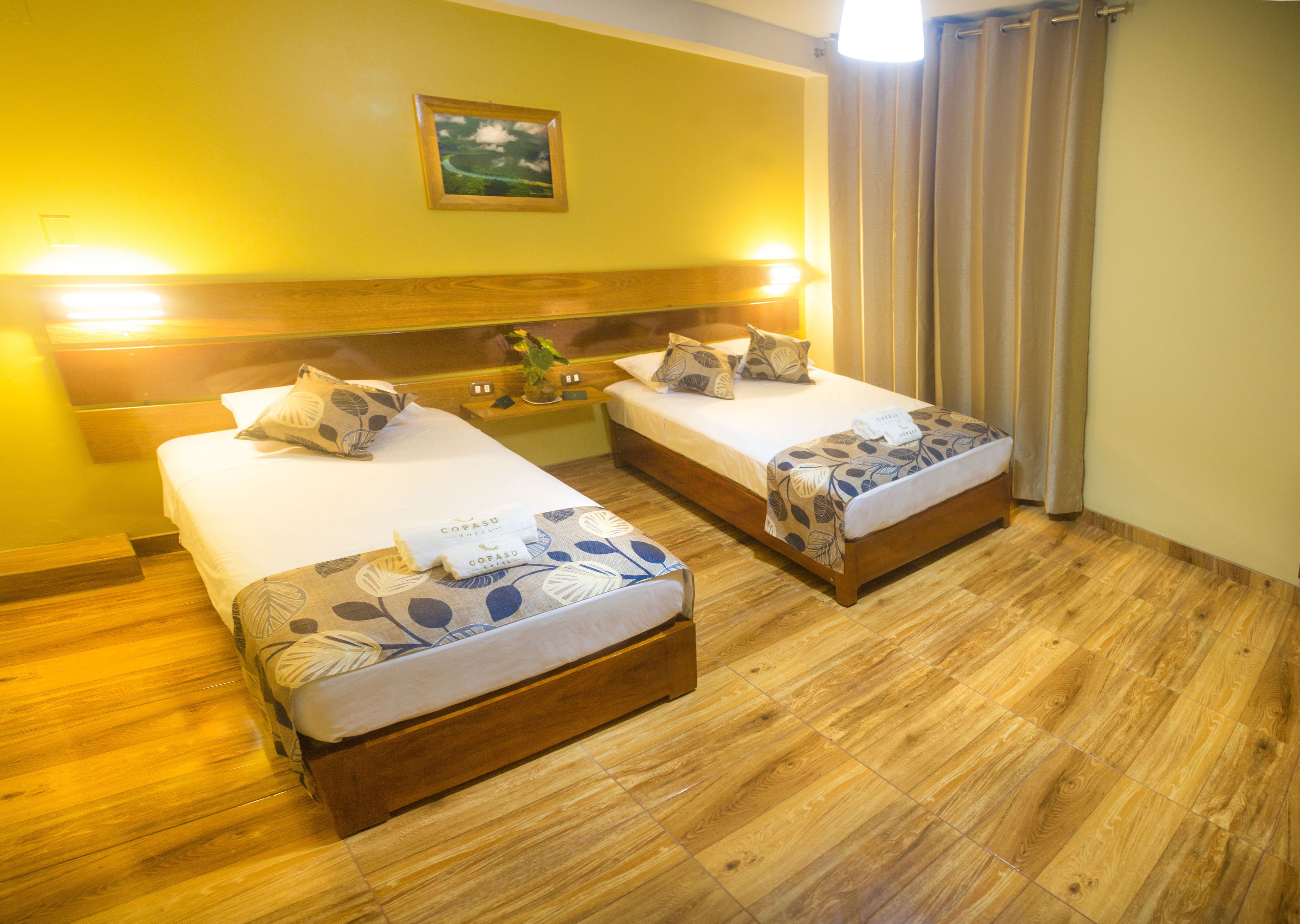 double room, private bathroom | in-room safe, desk, blackout curtains, iron/ironing board
