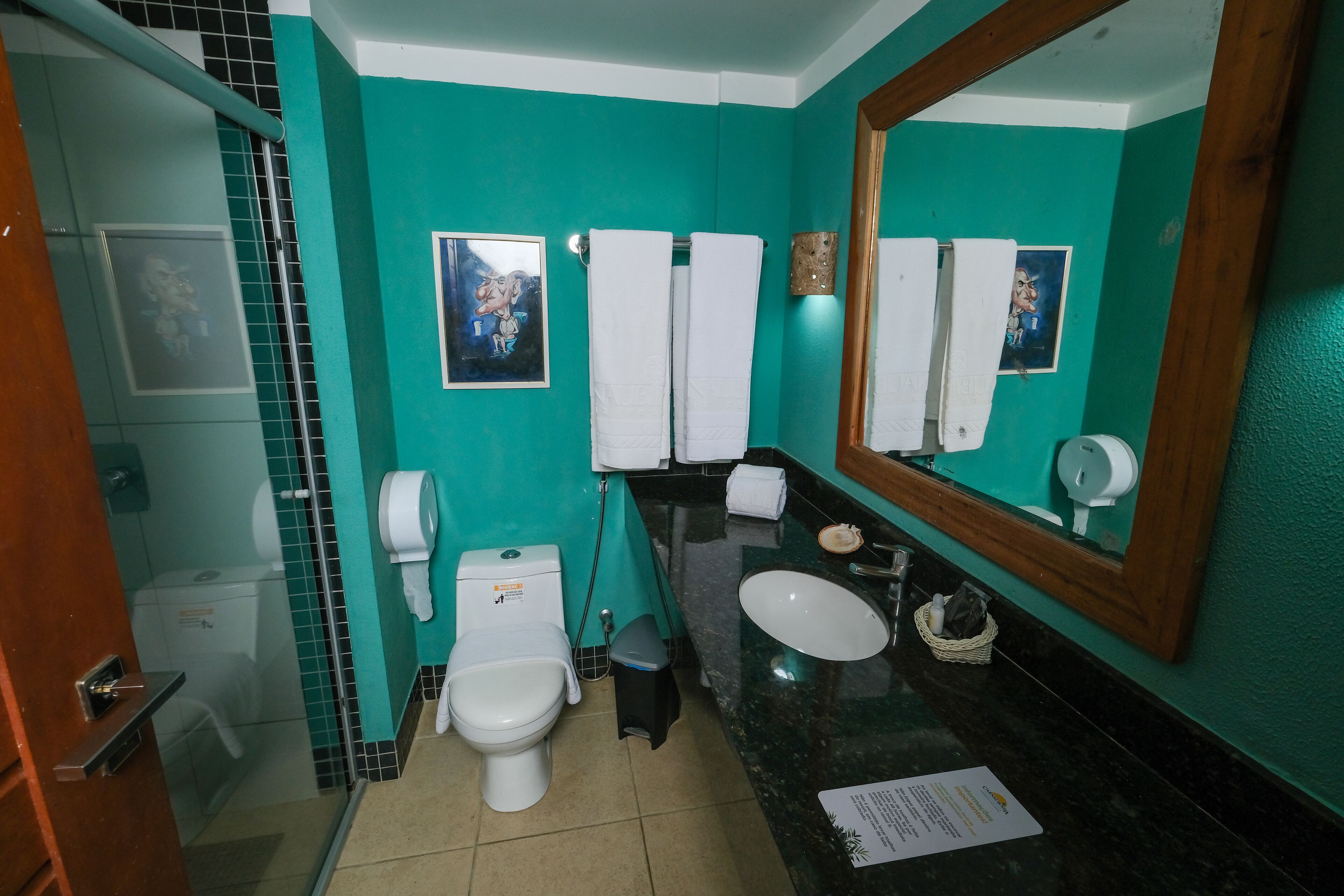 deluxe suite | bathroom | shower, free toiletries, hair dryer, towels