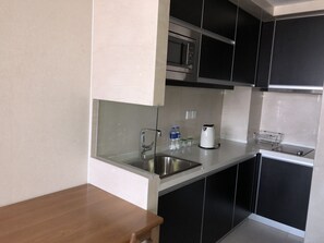 Shower, free toiletries, hair dryer, slippers
