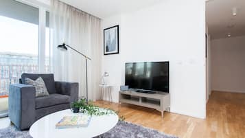 Superior Apartment, 3 Bedrooms | Living room | Flat-screen TV