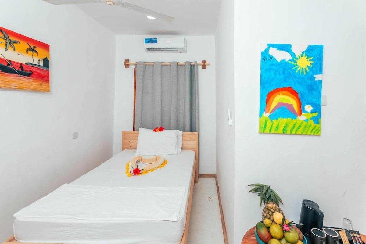 Desk, laptop workspace, individually furnished, bed sheets