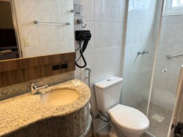 Shower, free toiletries, hair dryer, towels