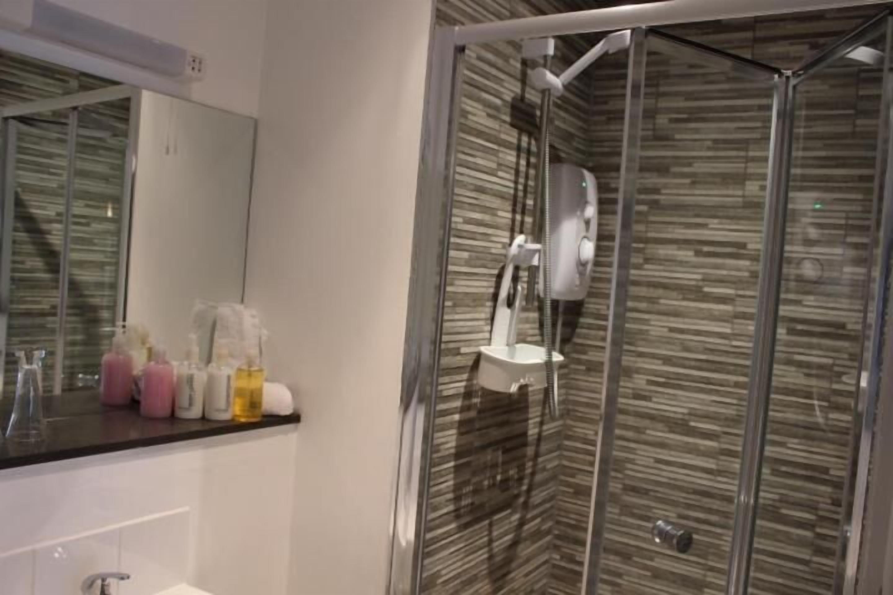 Shower, free toiletries, hair dryer, towels