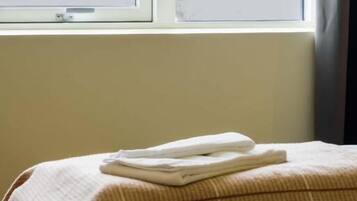 Habitación doble | Escritorio, cortinas blackout, insonorización y cunas gratuitas