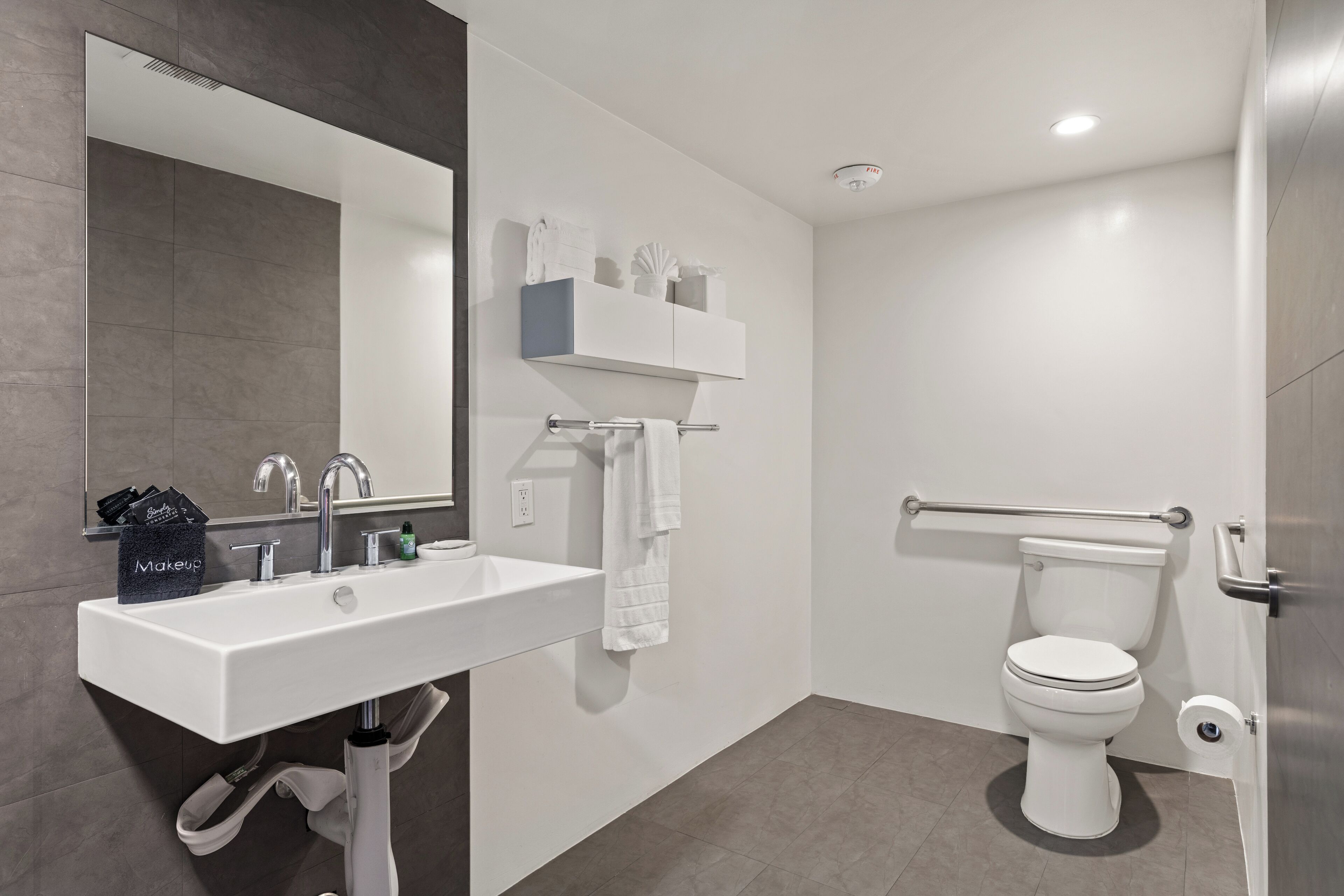 rainfall showerhead, designer toiletries, hair dryer, bathrobes