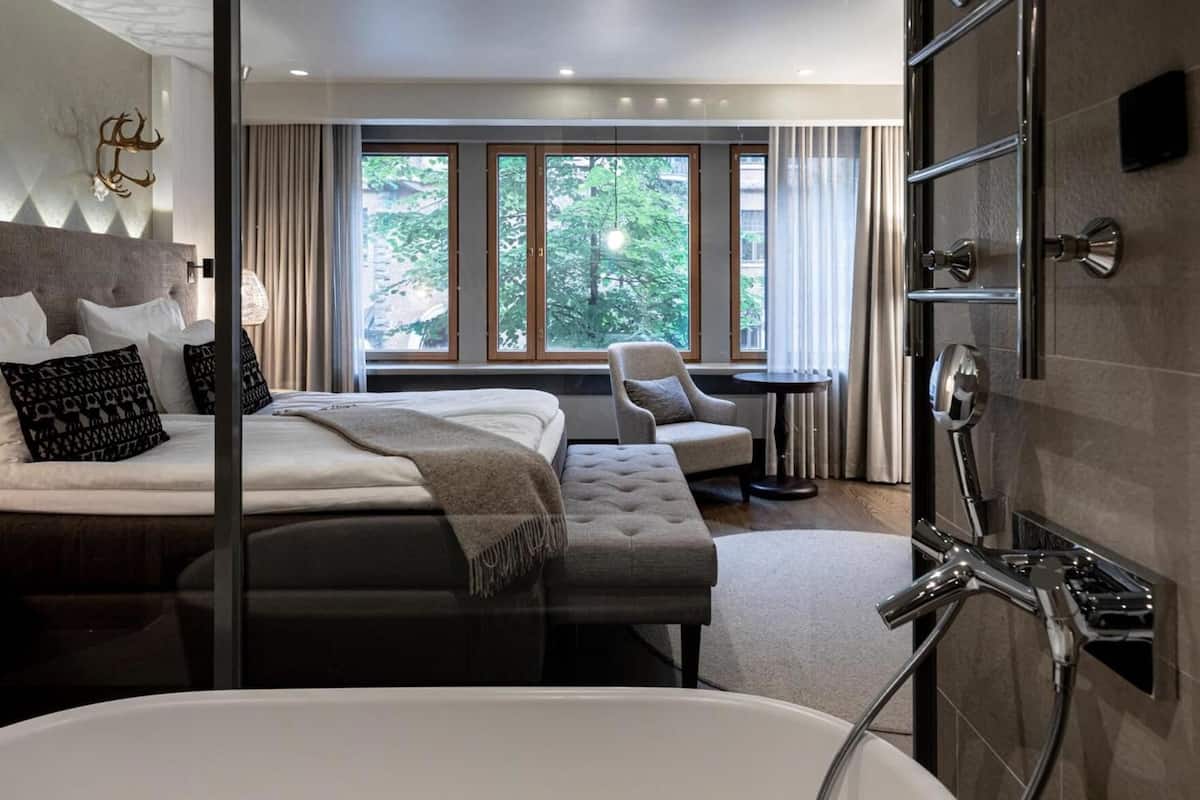 Premium bedding, memory foam beds, minibar, in-room safe
