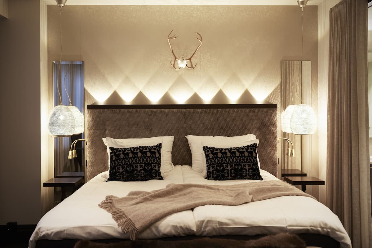 Premium bedding, memory foam beds, minibar, in-room safe