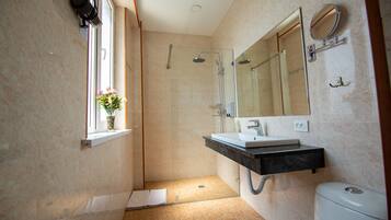 Shower, free toiletries, hair dryer, bathrobes