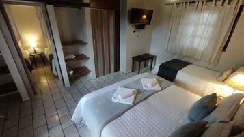 Family Quadruple Room, 1 Bedroom | Minibar, individually decorated, desk, blackout drapes