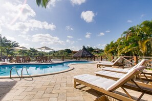 Outdoor pool, pool umbrellas, sun loungers
