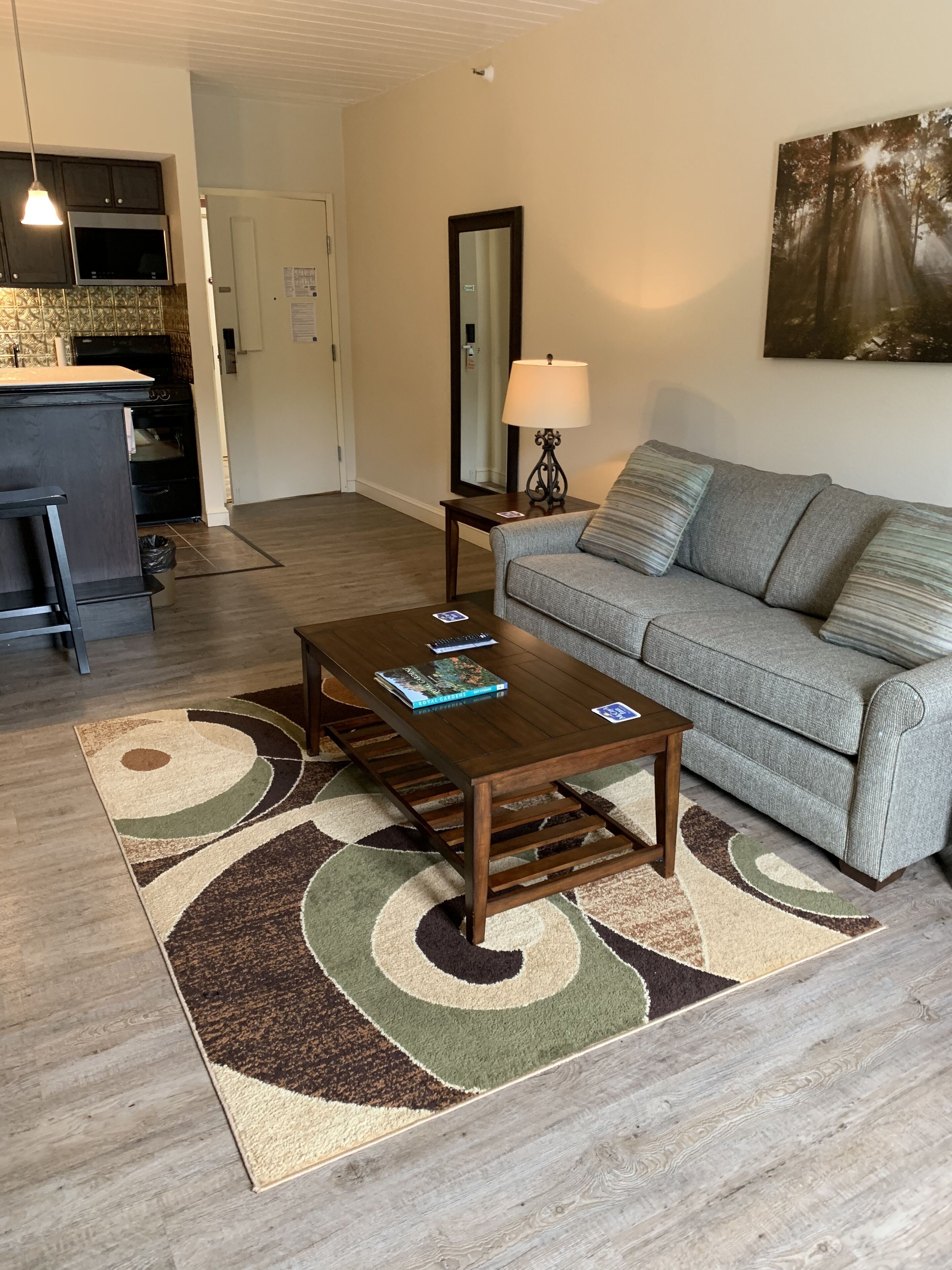 Exclusive Suite, 1 Queen Bed with Sofa bed | Living area | 55-inch Smart TV with cable channels, TV