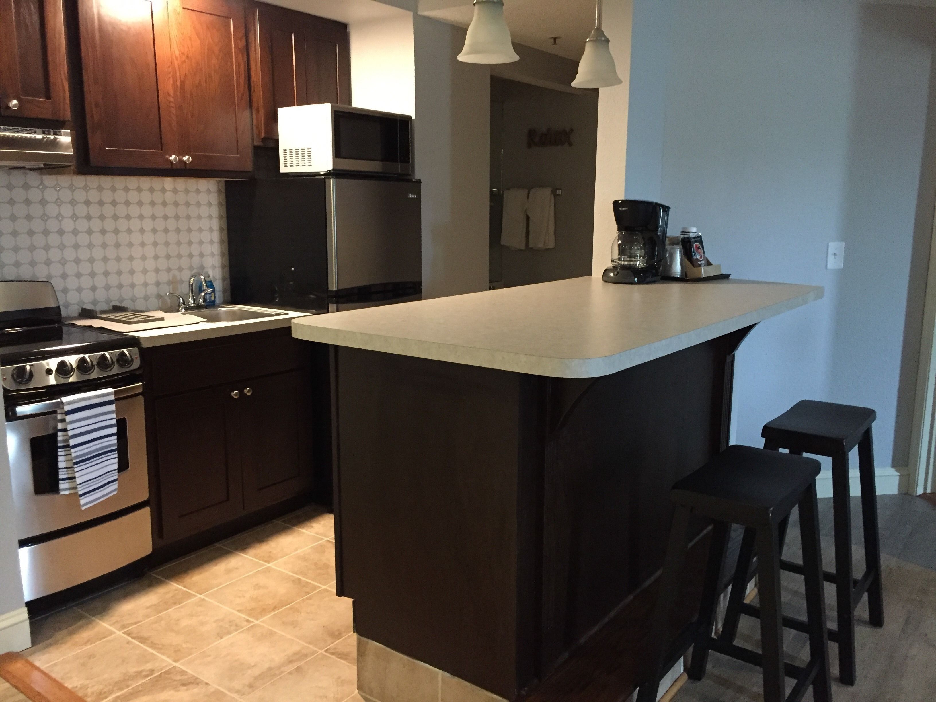 deluxe suite | private kitchen | mini-fridge, microwave, coffee/tea maker, freezer