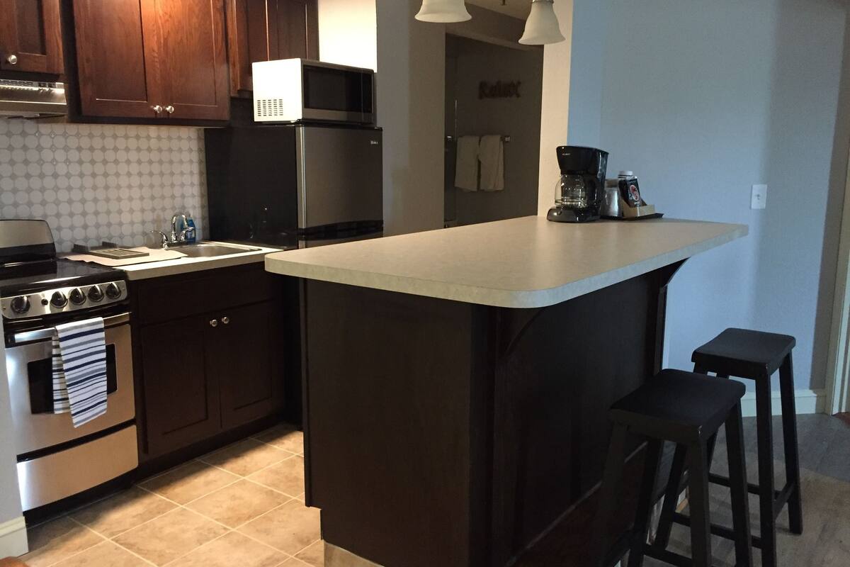 deluxe suite | private kitchen | mini-fridge, microwave, coffee/tea maker, freezer