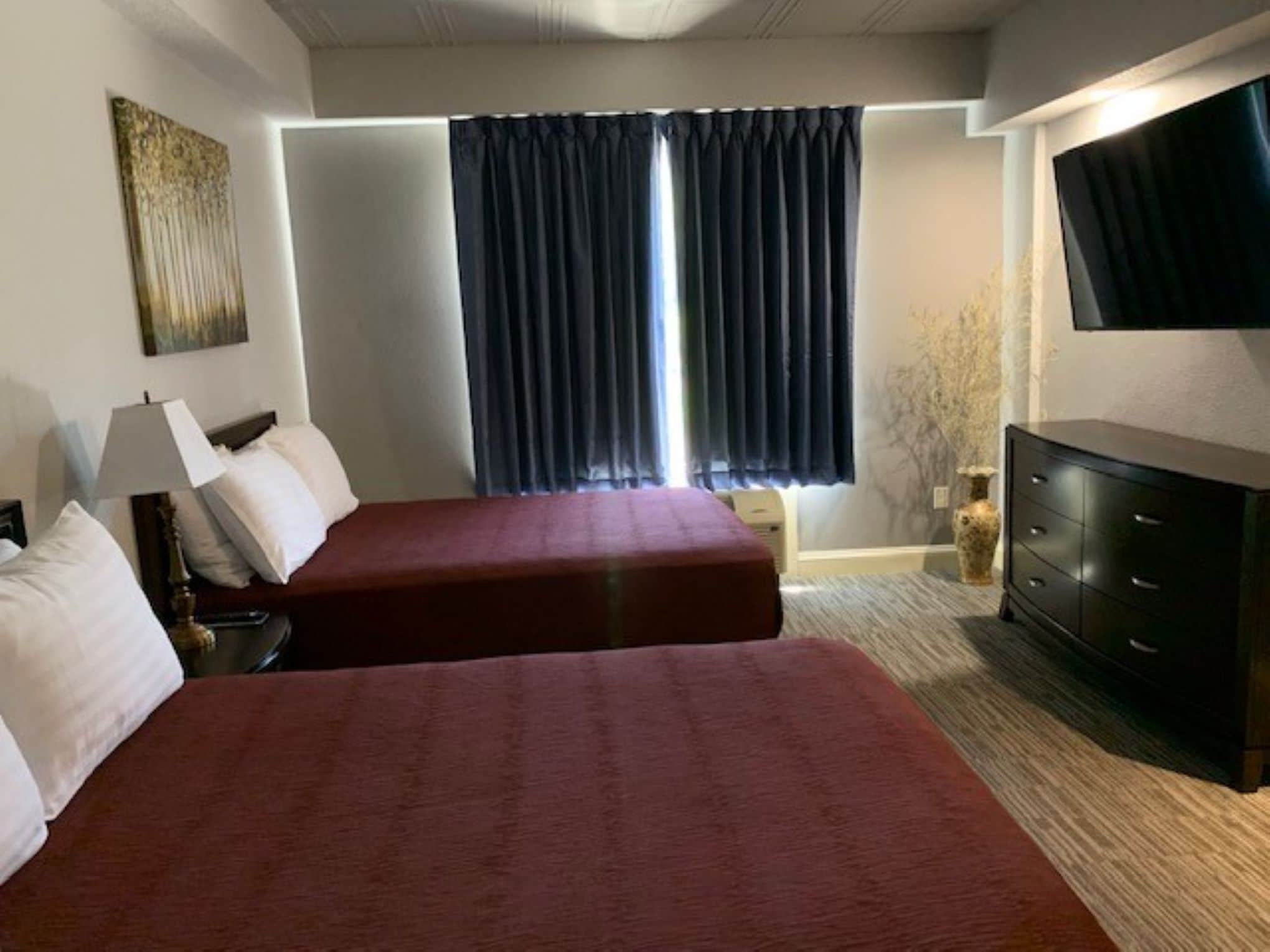 suite, multiple beds | 1 bedroom, premium bedding, blackout curtains, iron/ironing board