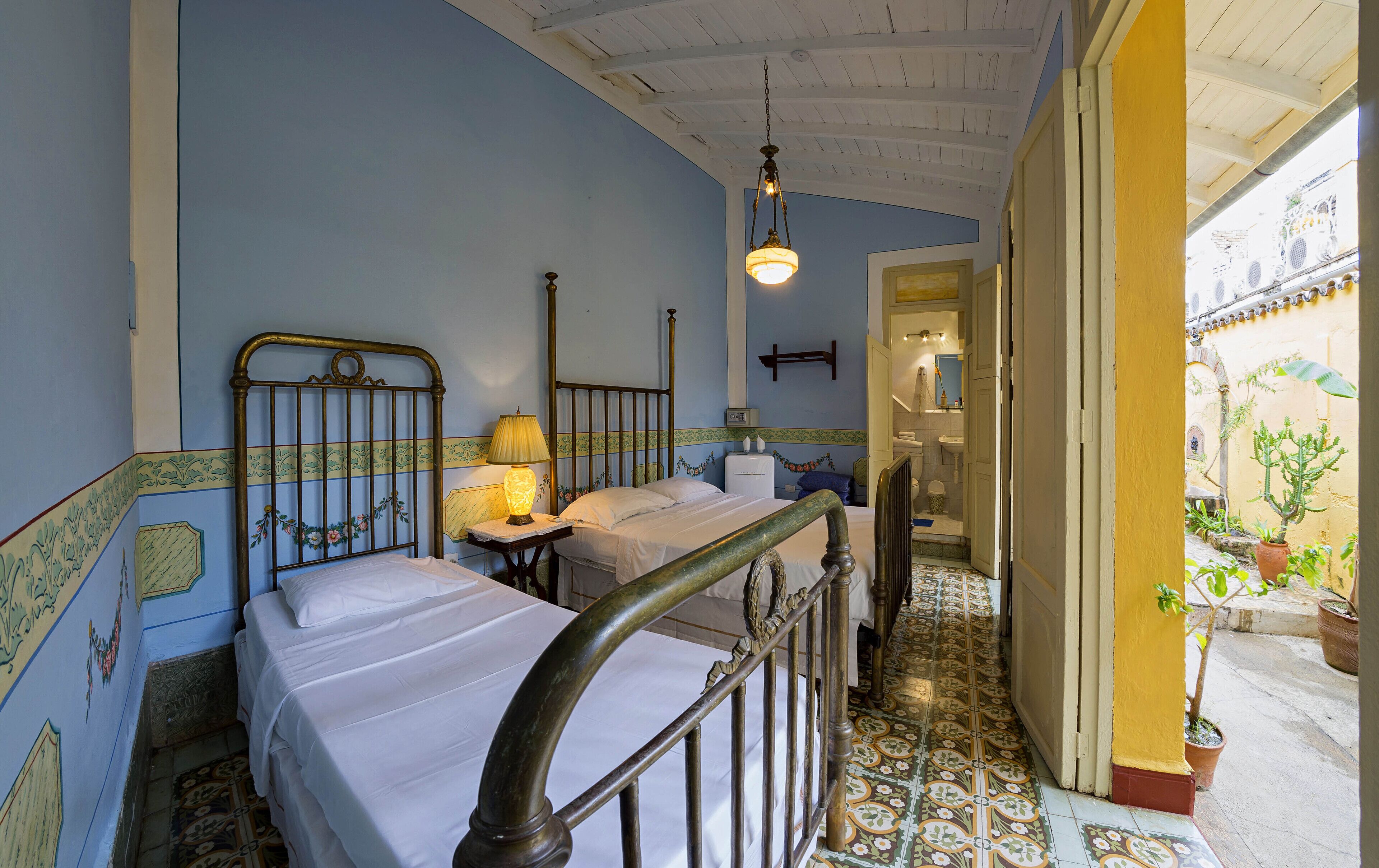 classic triple room, multiple beds | 1 bedroom, minibar, in-room safe, individually decorated